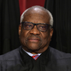 WASHINGTON, DC - OCTOBER 07: United States Supreme Court Associate Justice Clarence Thomas poses for an official portrait at the East Conference Room of the Supreme Court building on October 7, 2022, in Washington, DC. The Supreme Court has begun a new term after Associate Justice Ketanji Brown Jackson was officially added to the bench in September.